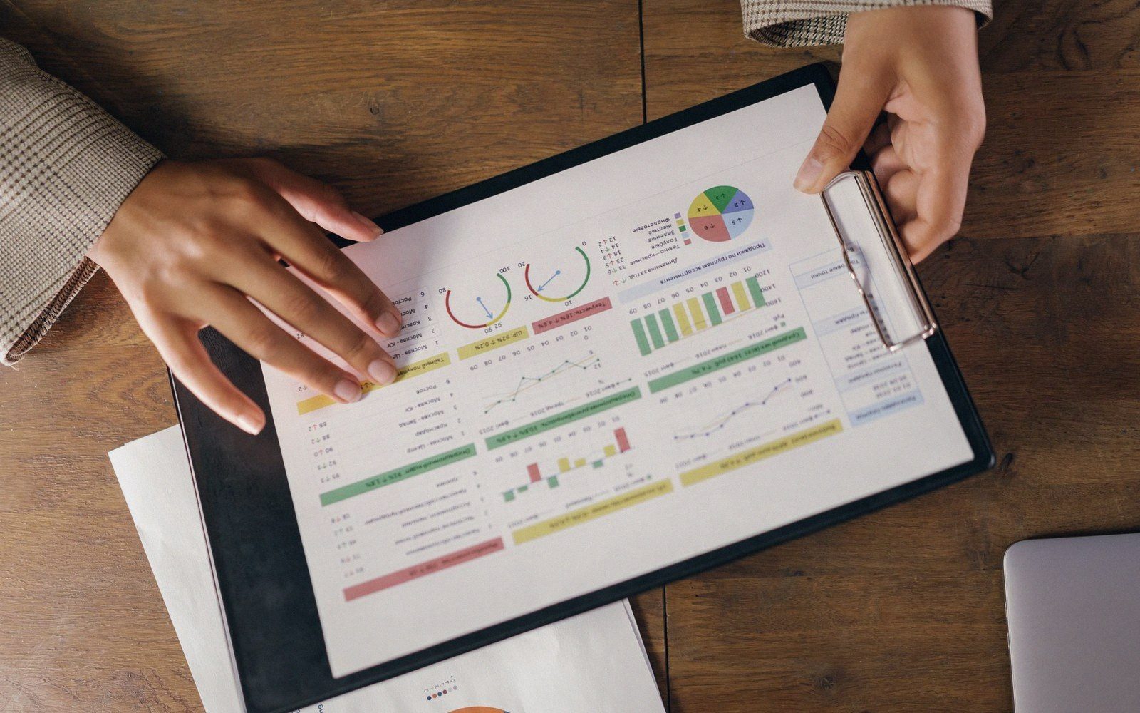 A statistical bulletin open at a table of figures